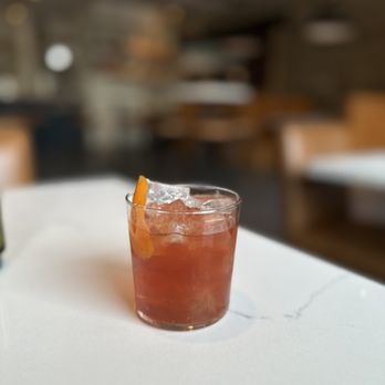 Easy Does It - a drink in a glass on a table - Bars Near Me - Chicago, Illinois Easy Does It - a drink in a glass on a table - Bars Near Me - Chicago, Illinois