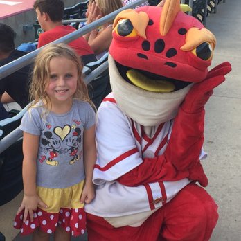 Florida Fire Frogs - My daughter with the mascot striker - Professional Sports Teams Near Me