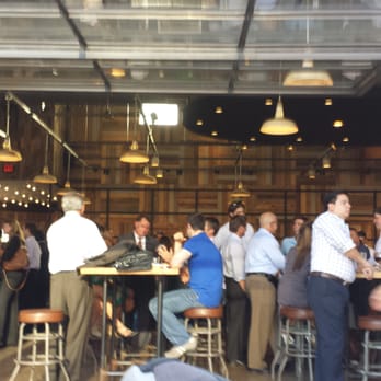 The Rustic - From the outside looking into the inside of the Rustic. - New American Near Me - Dallas, Texas