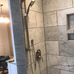 Bathroom shower remodel. Old pan leaked insurance company covered the bulk of the repairs.