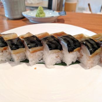 Sake 107 - Pressed sushi with Eiji San's house cured mackerel. Super good! - Izakaya Near Me - Petaluma, California Sake 107 - Pressed sushi with Eiji San's house cured mackerel. Super good! - Izakaya Near Me - Petaluma, California