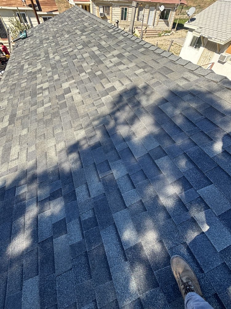 Slide of ARG Roofing Services