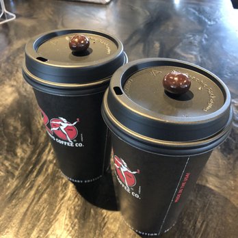 Mercurys Coffee - Latte with free chocolate bean - Coffee & Tea Near Me - Bellevue, Washington Mercurys Coffee - Latte with free chocolate bean - Coffee & Tea Near Me - Bellevue, Washington