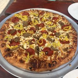 We made our own pizza with the white sauce and added everything else. A 10/10, great service, cute atmosphere, and even better food.