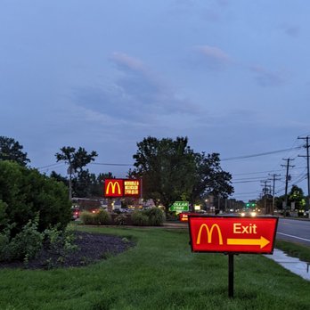 McDonald's - a mcdonald's sign in the foreground - Fast Food Near Me - Cheshire, Connecticut McDonald's - a mcdonald's sign in the foreground - Fast Food Near Me - Cheshire, Connecticut