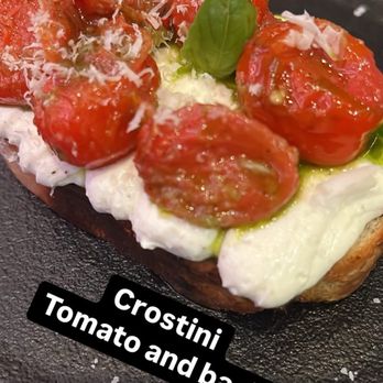 Sally's Apizza - Crostini with tomato and basil - Italian Near Me - Farmington, Connecticut Sally's Apizza - Crostini with tomato and basil - Italian Near Me - Farmington, Connecticut