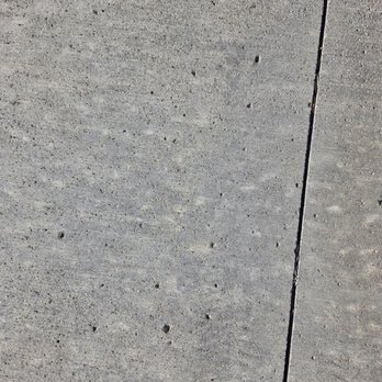 I-80 Concrete - Pits all over the entire driveway - Masonry/Concrete Near Me - Clive, Iowa I-80 Concrete - Pits all over the entire driveway - Masonry/Concrete Near Me - Clive, Iowa