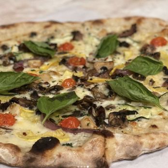 Saint Bibiana - a close up of a pizza - Pizza Near Me - Santa Barbara, California Saint Bibiana - a close up of a pizza - Pizza Near Me - Santa Barbara, California