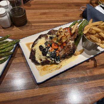 Pub Stop - Surf N' Turf. It normally comes with mashed potatoes but we both substituted. - Sports Bars Near Me - Waddell, Arizona