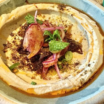 Yellow The Cafe - Lamb Awarma Hummus, Pom Molasses, Sumac Onions - Bakeries Near Me - Washington, DC, District of Columbia
