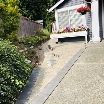 La Mora Landscaping - a driveway with a retaining wall - Landscaping Near Me - Marysville, Washington