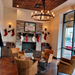 The Gents Place Barbershop Las Vegas- Summerlin - Sitting area by the fireplace