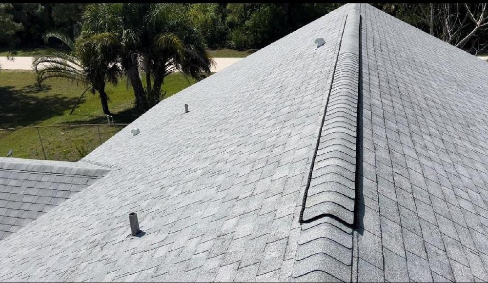 Slide of Charles Conry Roofing