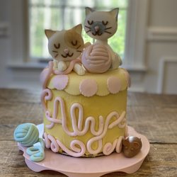 Spilled Milk Bakery - Kitten Cake with French buttercream and strawberry filling