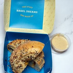 SEC stuffed everything bagel with sauce on the side.
