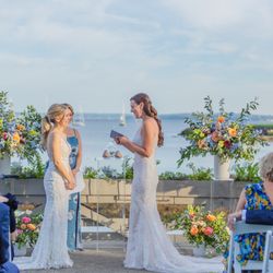 Petals & Roots - Ceremony floral pieces on clear acrylic pedestals/ smaller floor arrangements + rented clear acrylic pedestal for sand ceremony pieces