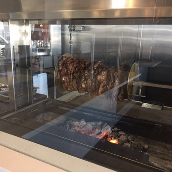 Beirut Street Food - The meat over the charcoal grill. Yum! - Donairs Near Me - Calgary, Alberta