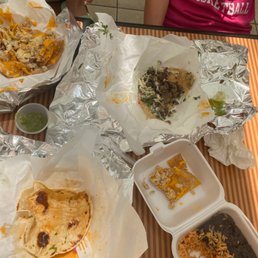 a table full of mexican food