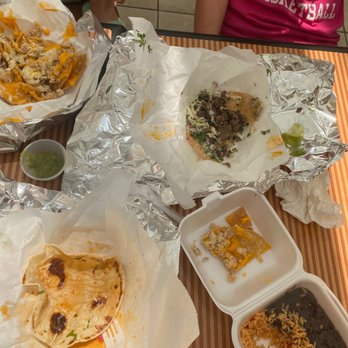 La Patrona - a table full of mexican food - Tacos Near Me - Bloomington, Illinois
