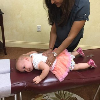 Ash Chiropractic & Acupuncture - This photo showes how much my baby daughter trusted Dr.Ash to work on her. - Acupuncture Near Me - Carrollton, Texas Ash Chiropractic & Acupuncture - This photo showes how much my baby daughter trusted Dr.Ash to work on her. - Acupuncture Near Me - Carrollton, Texas