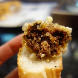 Irrintzi - Peanut Crusted Morcilla with Confit Tomato and Scorched Pepper