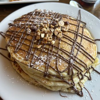 Farm Bell Kitchen - Pancakes with hazelnut topping - Southern Near Me - Charlottesville, Virginia Farm Bell Kitchen - Pancakes with hazelnut topping - Southern Near Me - Charlottesville, Virginia