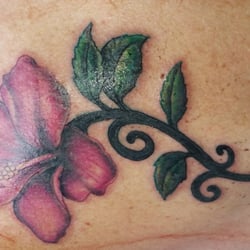 Black Lotus Custom Tattoos - First tattoo is hibiscus I like the detail. Cole did a great job. Thanks