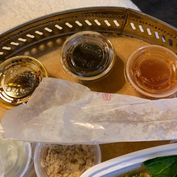 Wild Ginger - a variety of condiments on a tray - Chinese Near Me - Rockville Centre, New York Wild Ginger - a variety of condiments on a tray - Chinese Near Me - Rockville Centre, New York