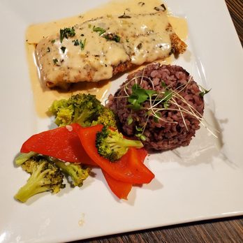 One Eleven Grill - Salmon with wild rice, and seasoned vegetables. - Wine Bars Near Me - Red Deer, Alberta One Eleven Grill - Salmon with wild rice, and seasoned vegetables. - Wine Bars Near Me - Red Deer, Alberta