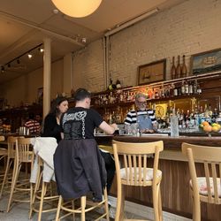 Long bar with comfy bar stools