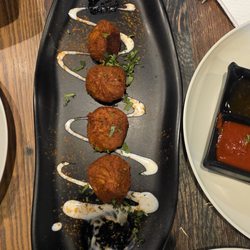 Chai & Kathi Roll Lounge - Tandoori momos