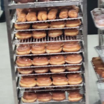 Randy's Donuts - One of the many racks of donuts, ready for our consuption. - Donuts Near Me - Fresno, California Randy's Donuts - One of the many racks of donuts, ready for our consuption. - Donuts Near Me - Fresno, California