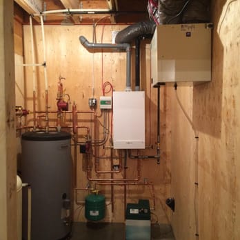 Alberta Bound Plumbing, Heating and Gasfitting - Residential boiler installation with indirect hot water heater, in slab radiant heating & HRV unit. - Plumbing Near Me Alberta Bound Plumbing, Heating and Gasfitting - Residential boiler installation with indirect hot water heater, in slab radiant heating & HRV unit. - Plumbing Near Me