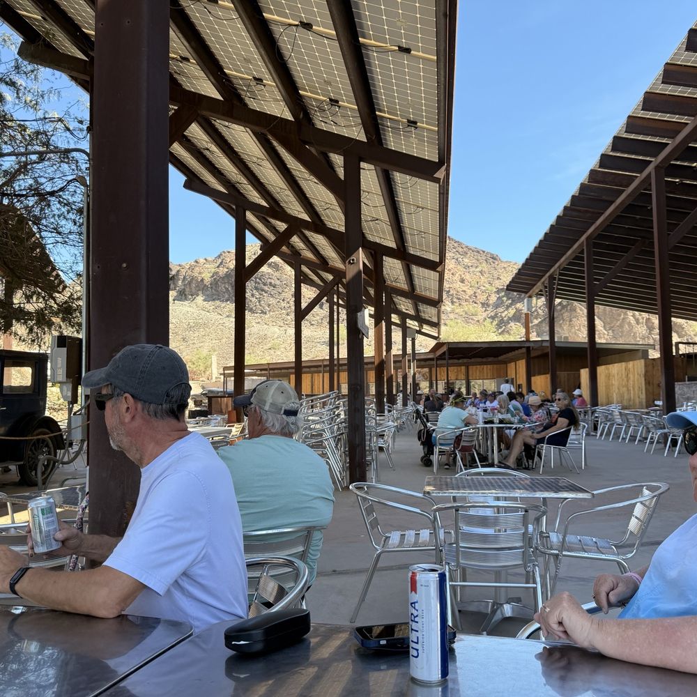The Desert Bar - Walk up food and drink ordering window in the background. Solar panels on the top. - Bars Near Me - Parker, Arizona The Desert Bar - Walk up food and drink ordering window in the background. Solar panels on the top. - Bars Near Me - Parker, Arizona
