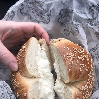 Olde Brooklyn Bagel Shoppe - sesame seed bagel with Plain Cream Cheese - Bagels Near Me - Brooklyn, New York Olde Brooklyn Bagel Shoppe - sesame seed bagel with Plain Cream Cheese - Bagels Near Me - Brooklyn, New York
