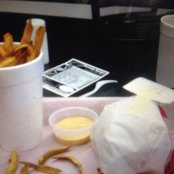 Tornado Burger - Here you see is the spicy cheeseburger wrapped. Inside are lettuce, tomatoes, and onions. The fries are delicious. - Burgers Near Me - Stafford, Texas Tornado Burger - Here you see is the spicy cheeseburger wrapped. Inside are lettuce, tomatoes, and onions. The fries are delicious. - Burgers Near Me - Stafford, Texas