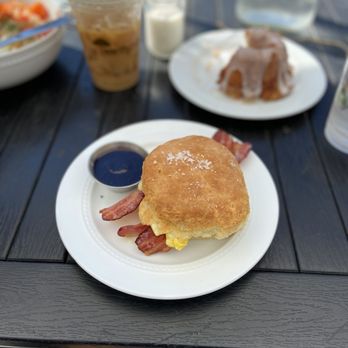 Gracious Plenty Bakery & Breakfast - Biscuit sandwich with bacon and scrambled egg. Definitely get the side of jam! No cheese necessary - Bakeries Near Me - Roswell, Georgia Gracious Plenty Bakery & Breakfast - Biscuit sandwich with bacon and scrambled egg. Definitely get the side of jam! No cheese necessary - Bakeries Near Me - Roswell, Georgia