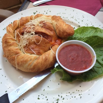 Strings Italian Cafe - Meat lovers calzone! Literally the best calzone I've ever had. The bread was top notch, sauce flavorful and meat was plentiful!! - Italian Near Me - Yreka, California