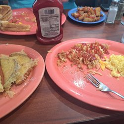 Old Fort - French Toast, hashbrowns, and scrambled eggs with cheese. Half the French Toast is gone because I couldn't resist digging in.