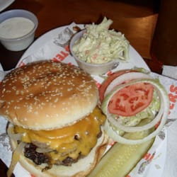 Burger, made my way (grilled onions and cheddar cheese) with coleslaw