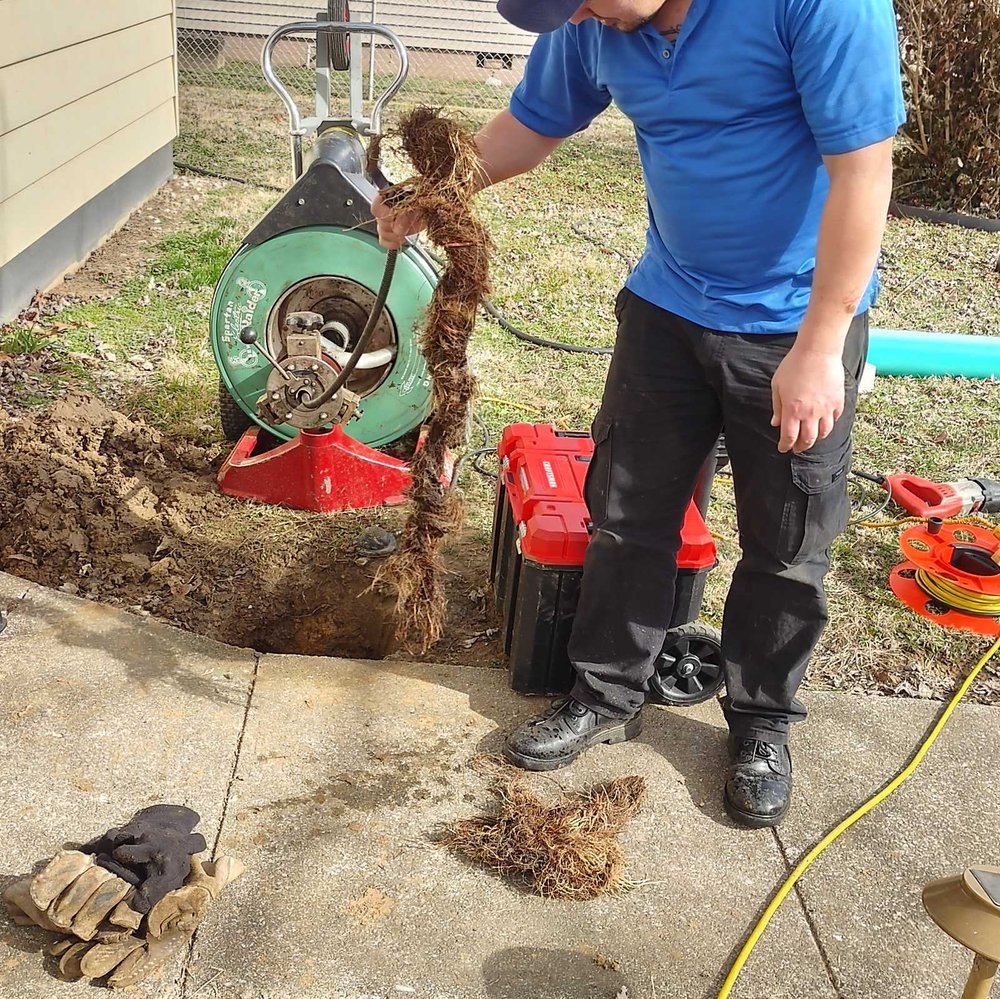 Slide of Mike's Drain Service