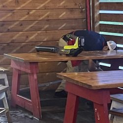 Hat Creek Burger Company - The sweet soothing sounds of a leaf blower to eat to. Debris flying into your food.. so nice