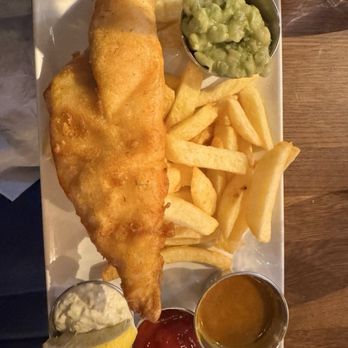 Quinlan's Seafood Bar - Fish and chips, creamed peas, tartar sauce. - Fish & Chips Near Me - Cork, Colorado