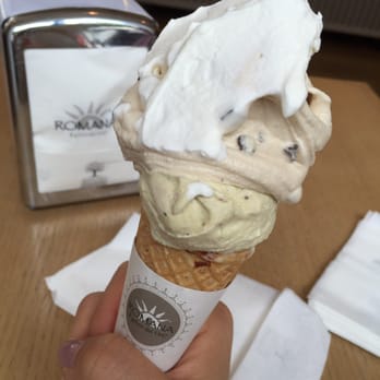 La Romana - Coffee tiramisu with chocolate chips and pistachio in a cone with whipped cream on top - Ice Cream & Frozen Yogurt Near Me - Rome, RM La Romana - Coffee tiramisu with chocolate chips and pistachio in a cone with whipped cream on top - Ice Cream & Frozen Yogurt Near Me - Rome, RM