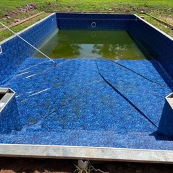 Doctor Feelgoode's - This is the new pool that they built. Because of their negligence the liner had to be replaced before the pool was even finished.