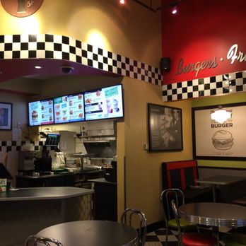Triple O's - a restaurant with checkered walls - Fast Food Near Me - Kamloops, British Columbia