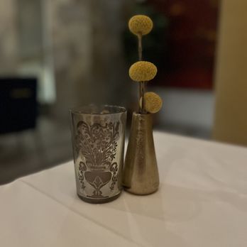Willies Modern Fare - a vase and a vase on a table - Modern European Near Me - Rancho Mirage, California Willies Modern Fare - a vase and a vase on a table - Modern European Near Me - Rancho Mirage, California