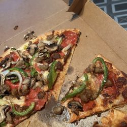 Pizza Hut - Wanted thick crust. Looks like a sliver was cut out or they messed up the pizza.. workers were laughing so much they couldn't talk.