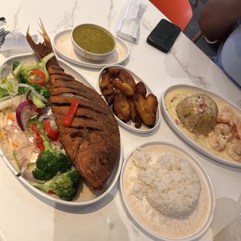 Malecón Express Restaurant - Fried red snapper w/ rice, peas, plantain and salad as well as the mofongo de Camarones - Caribbean Near Me - New York, New York