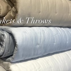 The Brass Bed, Fine Linens & Furnishings - We carry an astonishing array of cozy and comforting blankets and throws, including fine fibers like Kashmir, New Zealand wall, etc.